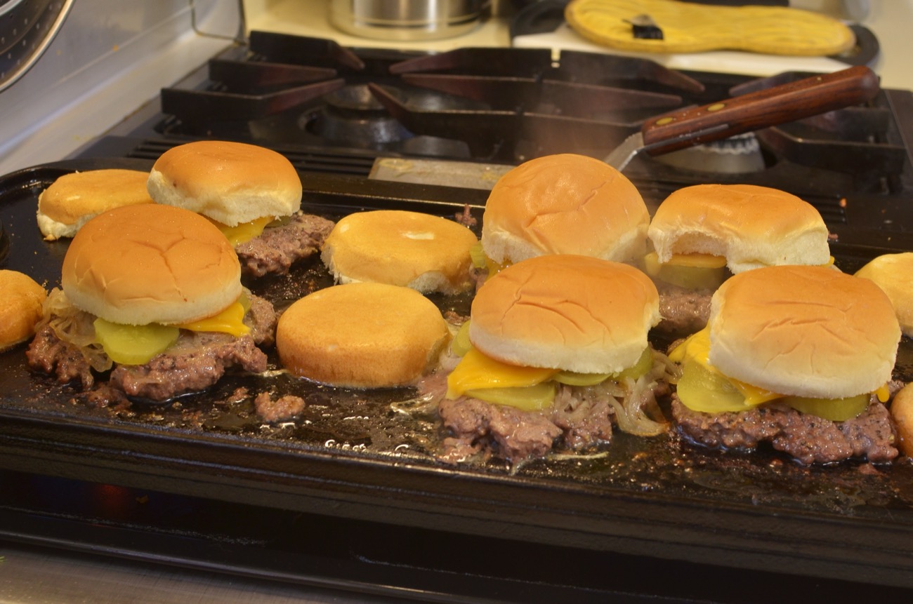 Cozy Inn's signature onion-fried slider hamburgers