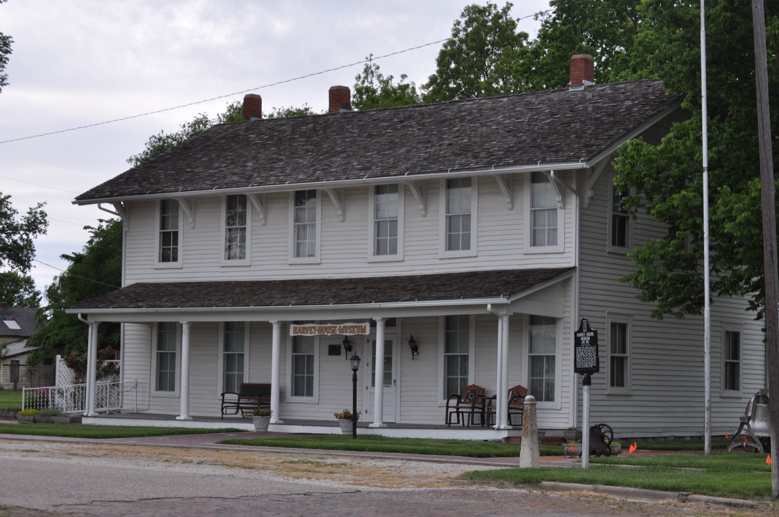 The Florence Harvey House Museum, a historic two-story brick building on Main Street in Florence, Kansas — one of the last remaining Fred Harvey establishments